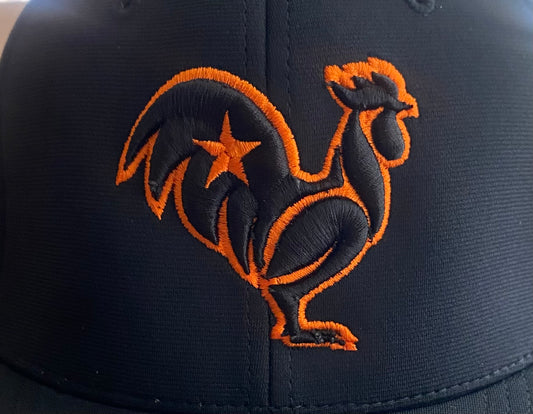 Black on black with bright orange outline & star