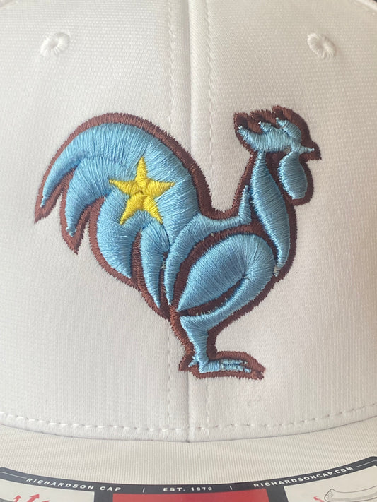 White hat with blue rooster, brown outline & yellow star