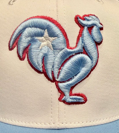 White and Columbia blue Snapback. Columbia blue rooster, white star, red outline