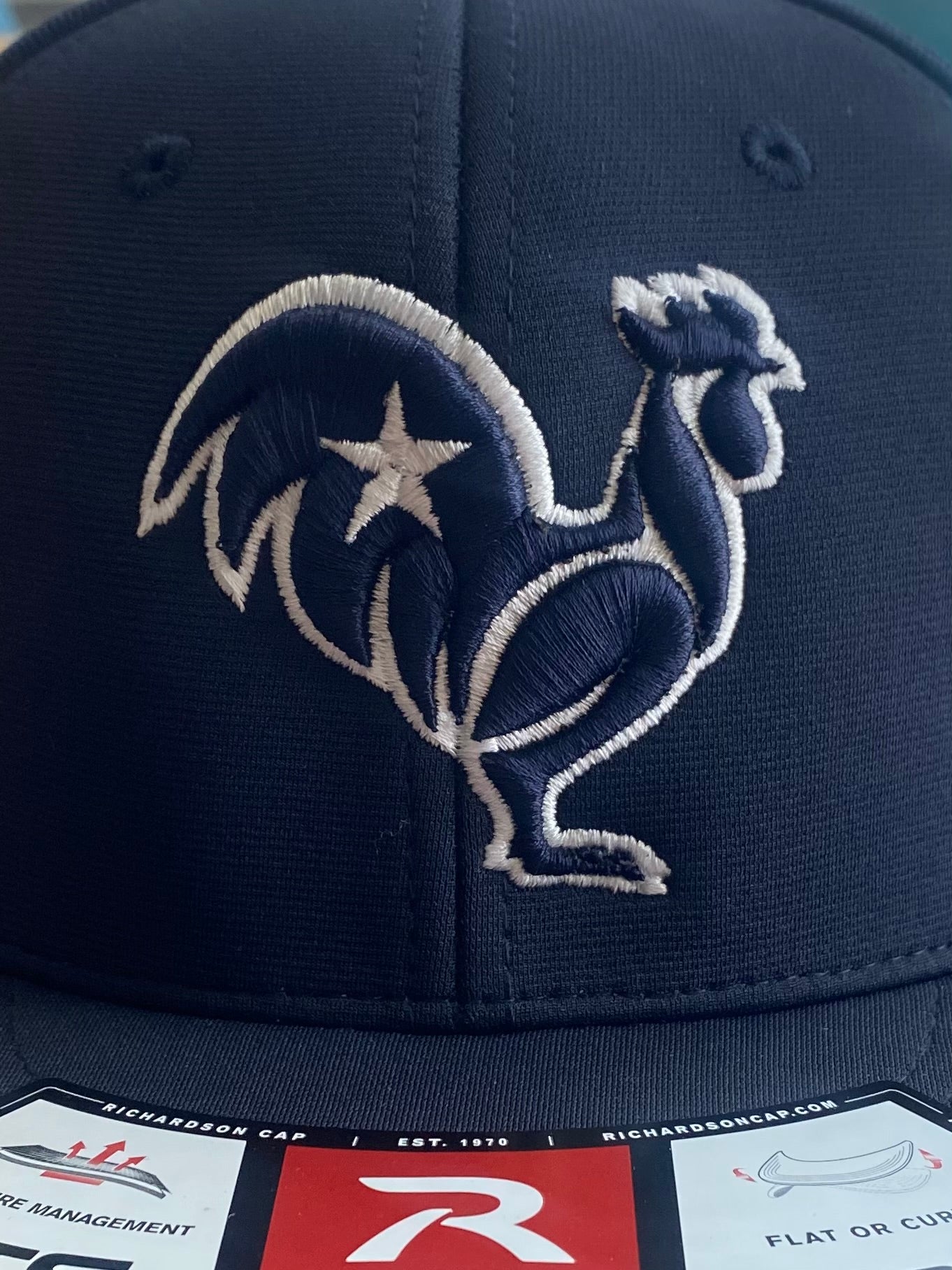 Navy on navy with white outline & star